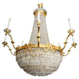 A Massive Louis XVI Style Bronze and Crystal Chandelier
