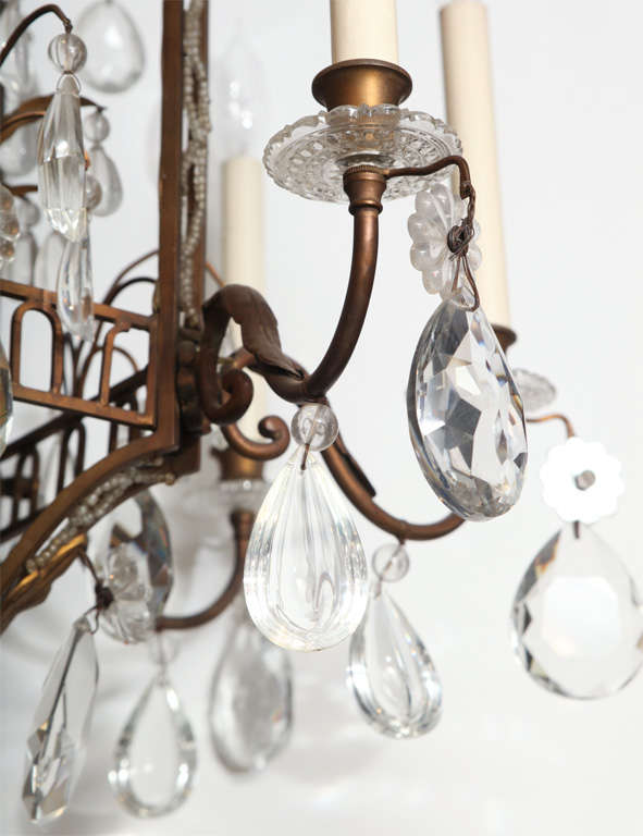French A Fine Cage Form Eight-Light Crystal and Bronze Chandelier