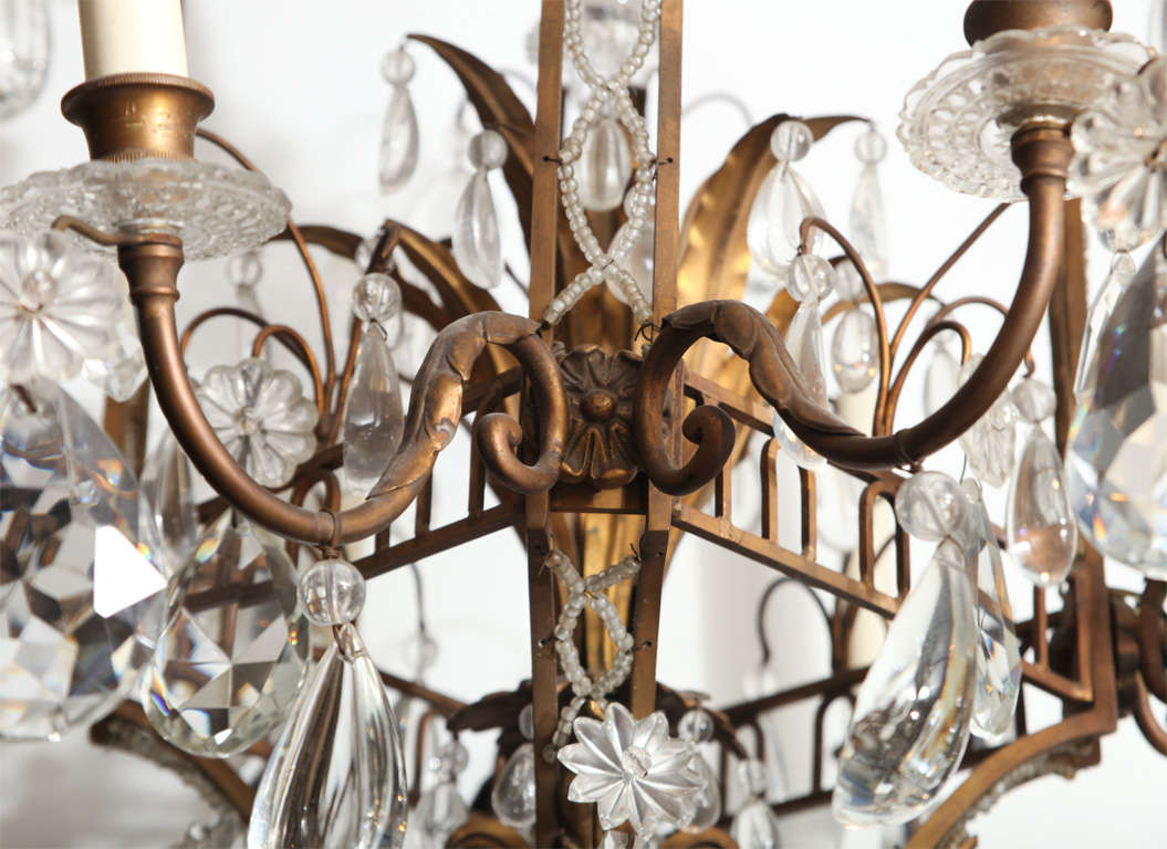 20th Century A Fine Cage Form Eight-Light Crystal and Bronze Chandelier