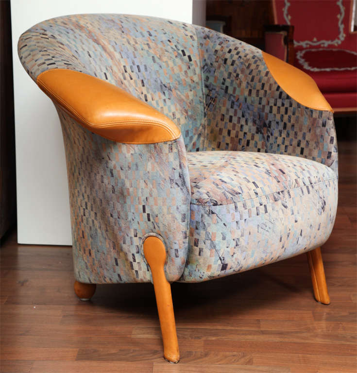 Pair of Postmodern bergères by Franz Wittman, Austrian, circa 1975 upholstered with velvet-textured Missoni fabric, with brown leather legs and armrests.