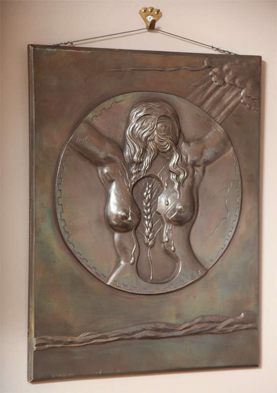 Salvador Dalí (Spanish, 1904-1989.)

Fécondité, 1977. Bas relief in silvered bronze.

 Publishing Year : 1990-1992. 

Referenced in the catalogue raisonne 