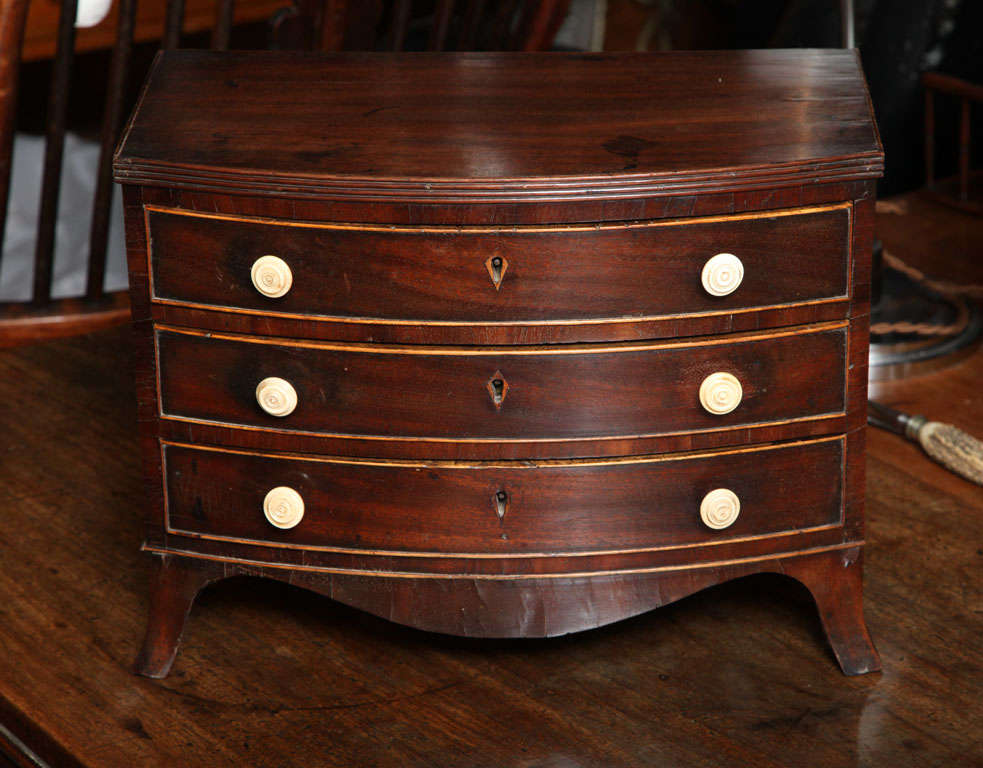 Miniature chest of drawers.

 