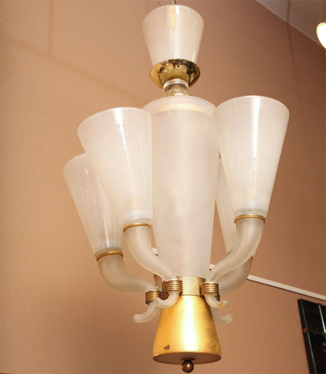 Venini glass chandelier. Opaline glass on burnished bronze and gold leaf frame.
