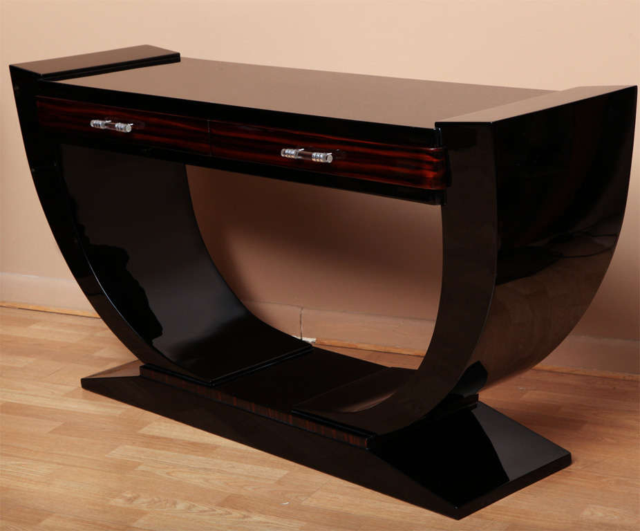 Lacquered Art Deco console table with two macassar ebony drawers with original polished chrome and glass handles.
