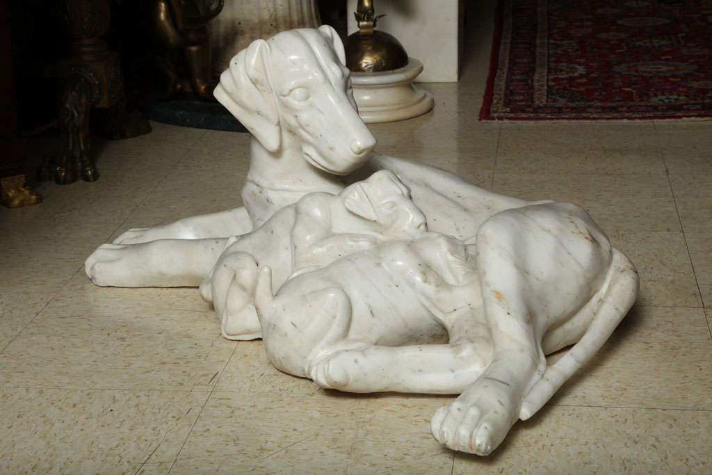 Very finely hand carved Italian marble group of A dog with her Puppies.