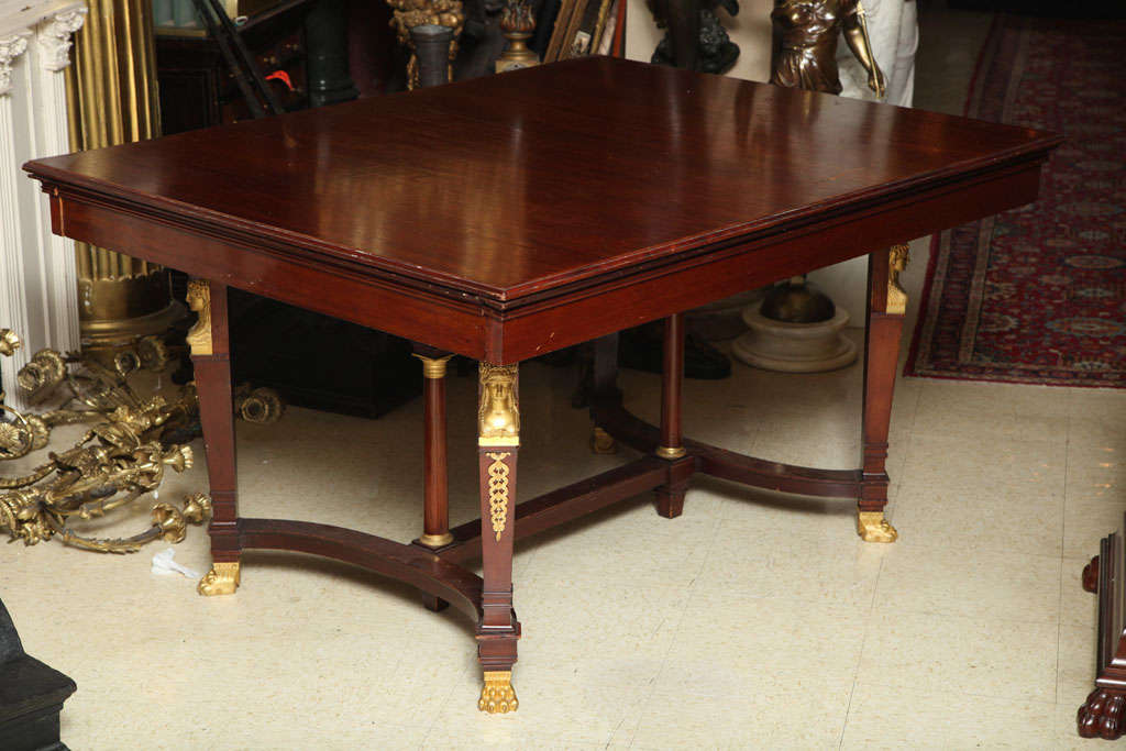 Very fine quality French gilt bronze-mounted mahogany dining room table.
Stock number: F7.
