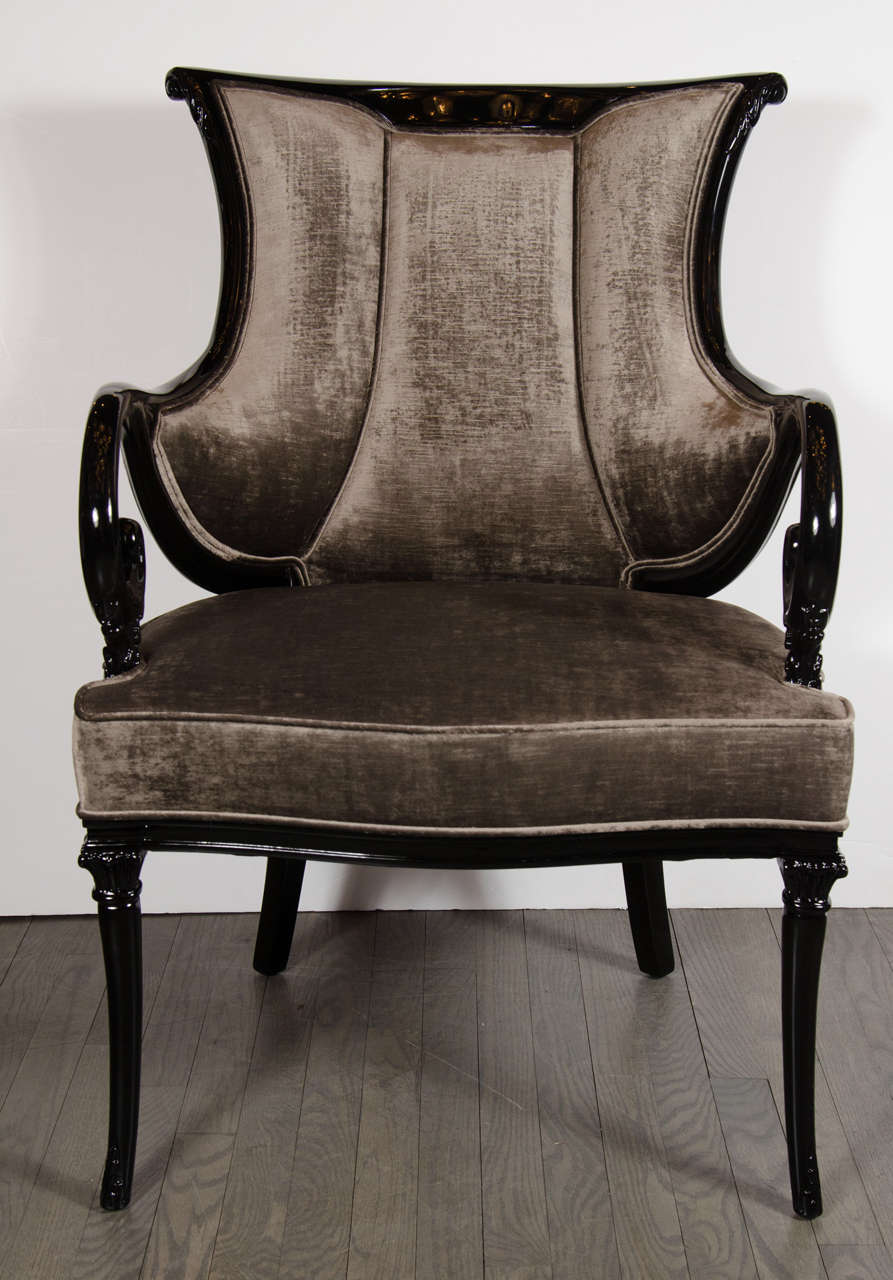 This captivating pair of elegant scroll from neoclassical chairs by Grosfeld House are sensational in design. Newly upholstered in smoked topaz velvet upholstery and ebonzied detailing, they are a superb addition to any living space. They are in