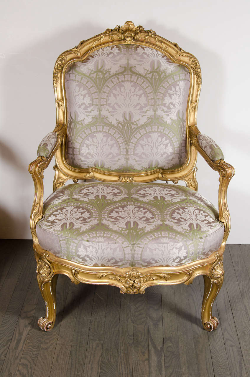 Gilt Pair of French Bergere Chairs and Ottoman in Gilded Wood and Satin Upholstery