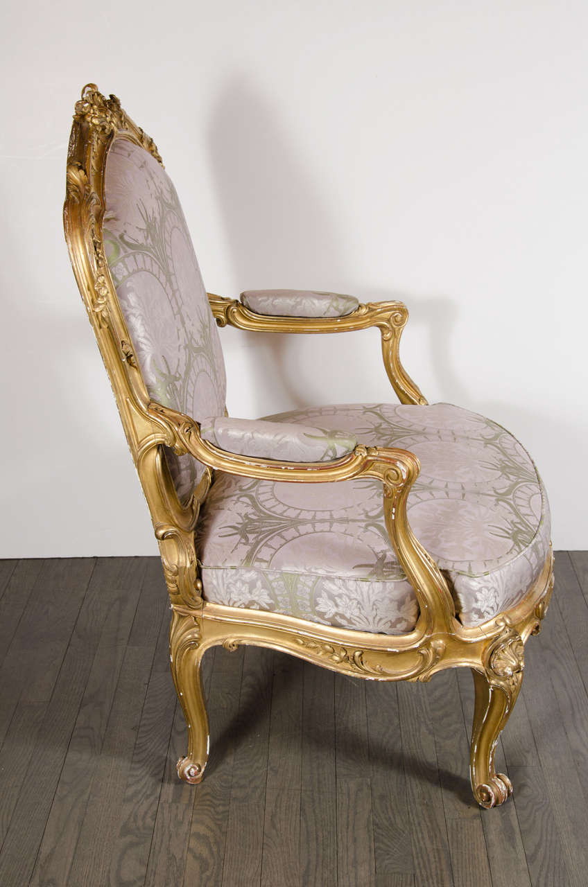 Late 19th Century Pair of French Bergere Chairs and Ottoman in Gilded Wood and Satin Upholstery