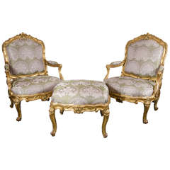 Antique Pair of French Bergere Chairs and Ottoman in Gilded Wood and Satin Upholstery