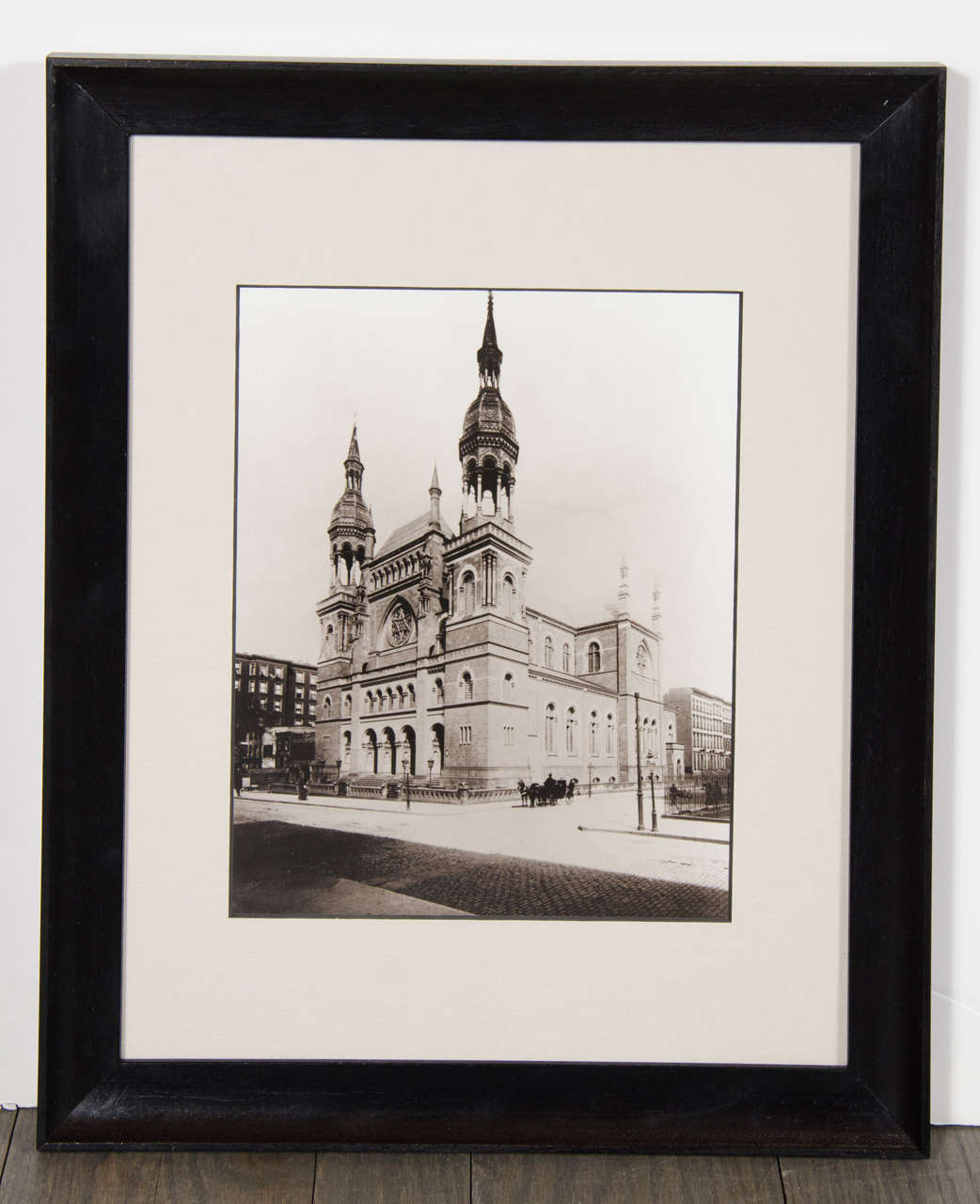 This early 20th century silver gelatin print depicts the iconic New York institution, Temple Emanu-El at its original location at 5th avenue and 43rd street in Manhattan, before it moved uptown to its present location at 5th avenue and 63rd street.