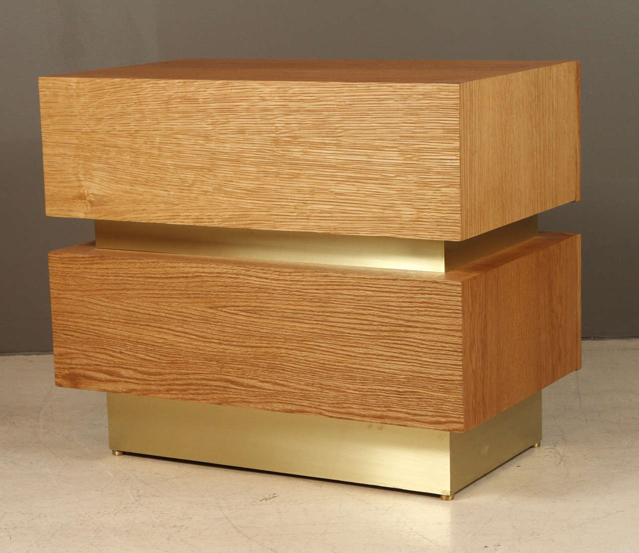 Stacked box nightstand in oiled oak and brass by Lawson-Fenning.

Available to order in various finishes with a 10-12 week lead time.