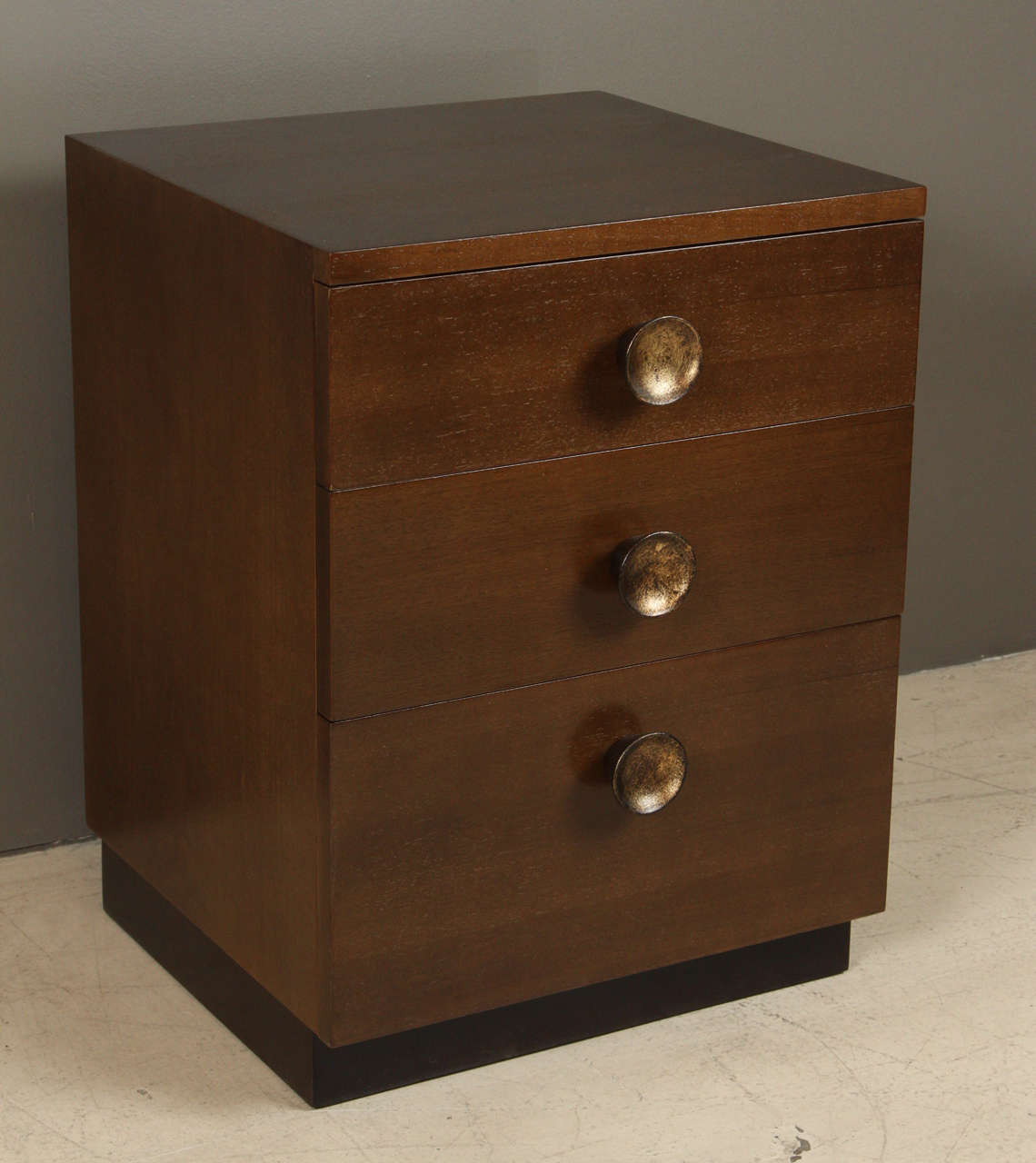 Pair of walnut bedside chests by Gilbert Rohde for Herman Miller.