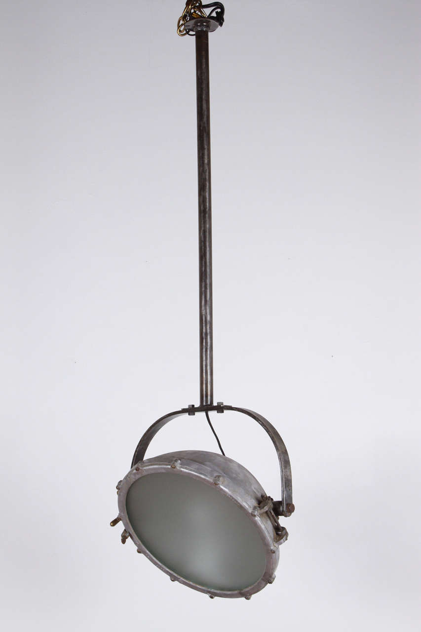 Terrific Industrial fixture manufactured by the Crouse-Hinds Company of Syracuse. Made of heavy steel with brass details; newly rewired for a single standard or reflector bulb.