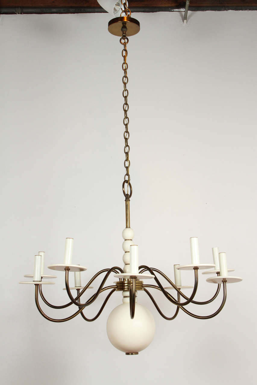 Wood and brass American chandelier.