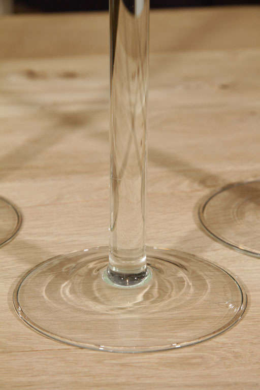 Tall elegant blown glass candleholders available in two heights: 14 inches and 18 inches.