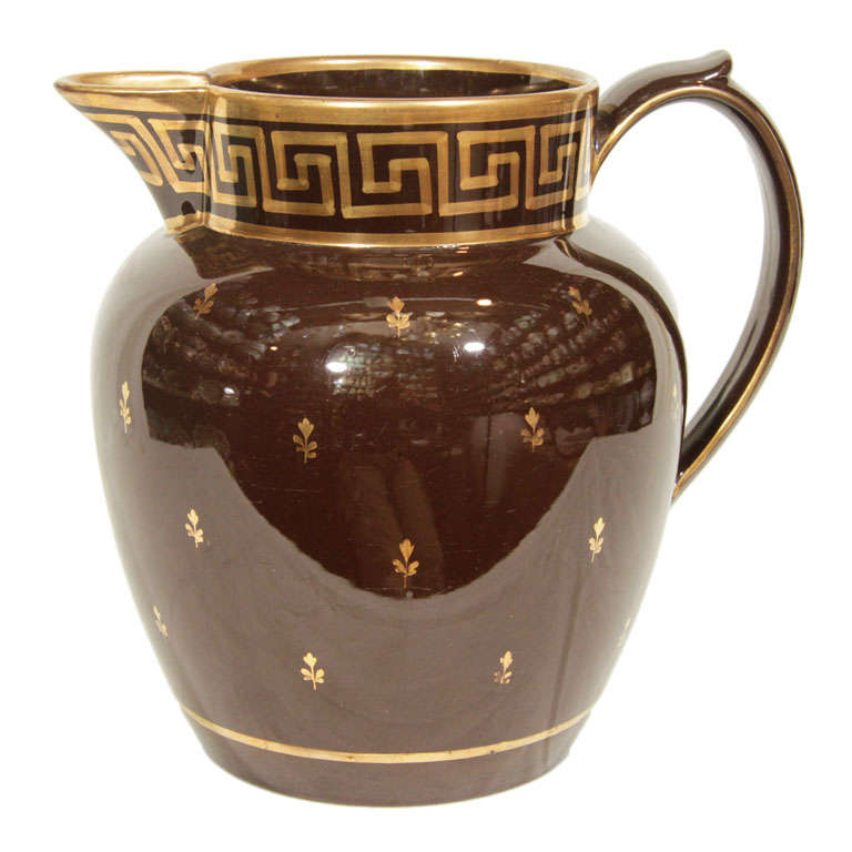 A Wilson Brown Jug with a Greek key Border