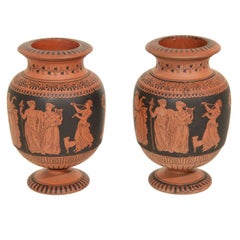 A Pair of Terra Cotta  Vases with Classical Figures