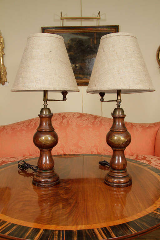 A pair of walnut pepper grinder, electrified