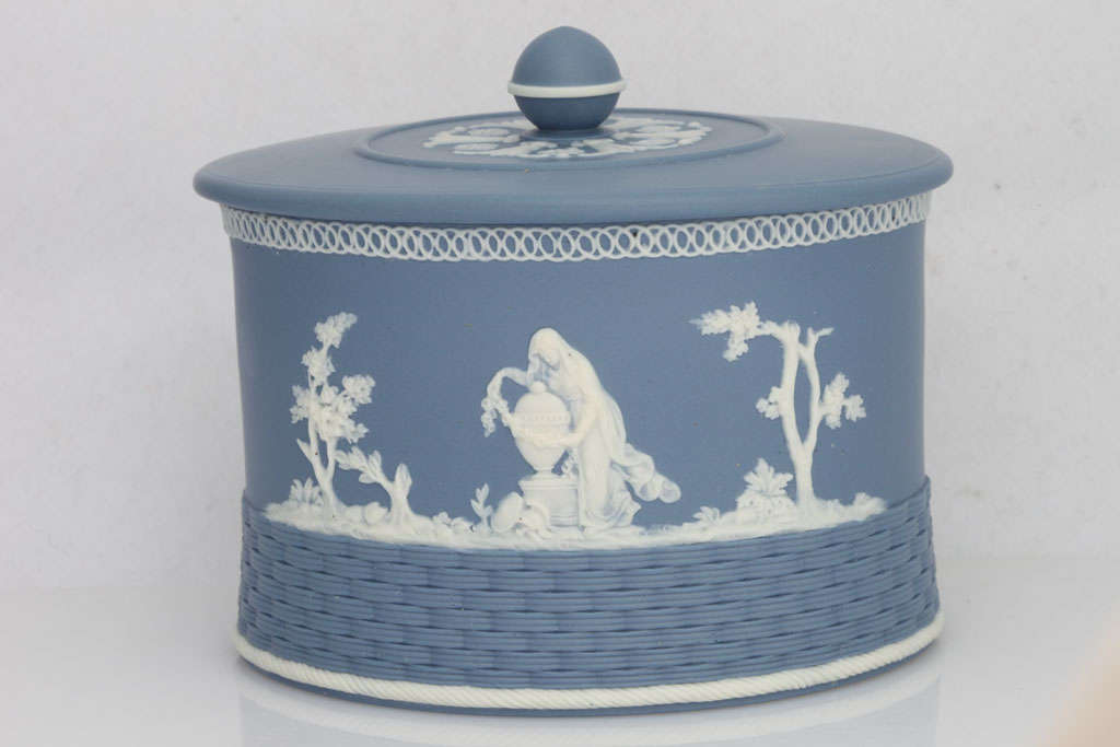 A fine signed Neale & Co blue and white jasper covered sugar bowl decorated with classical figures