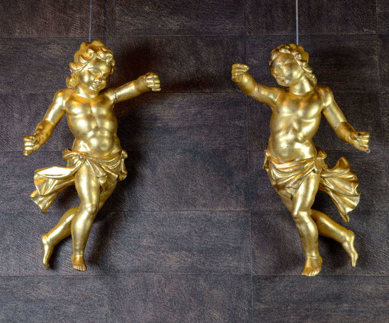 A pair of 18th century Italian hand gilded and carved figures of angels.
They could be suspended from a ceiling with each retaining its mounting hardware at the back,
Italy, Florence.