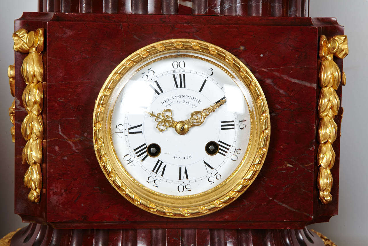 French Gorgeous mantel clock with candelabras signed Delafontaine. For Sale