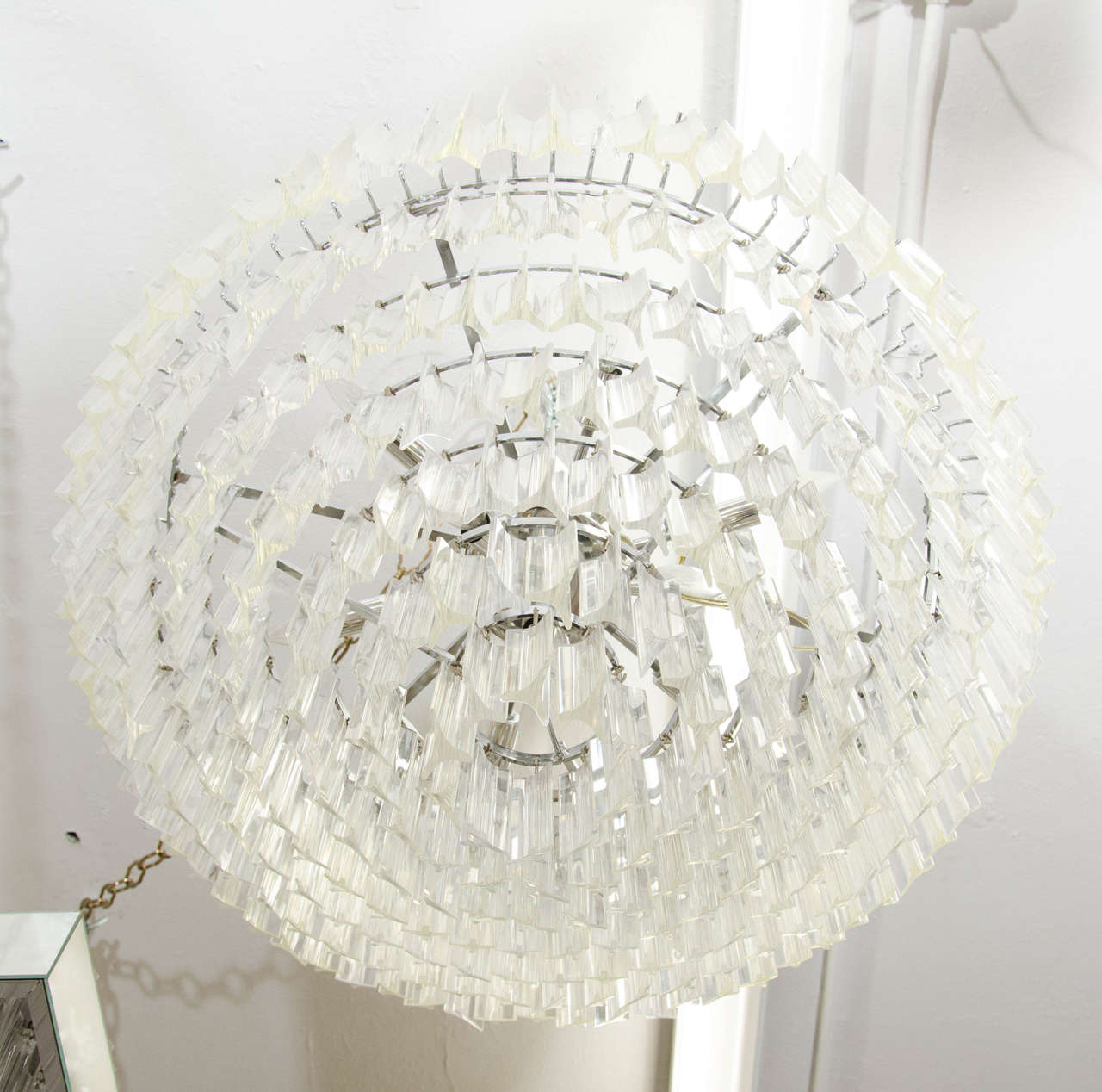 Midcentury large Lucite chandelier in a cascading circular form.