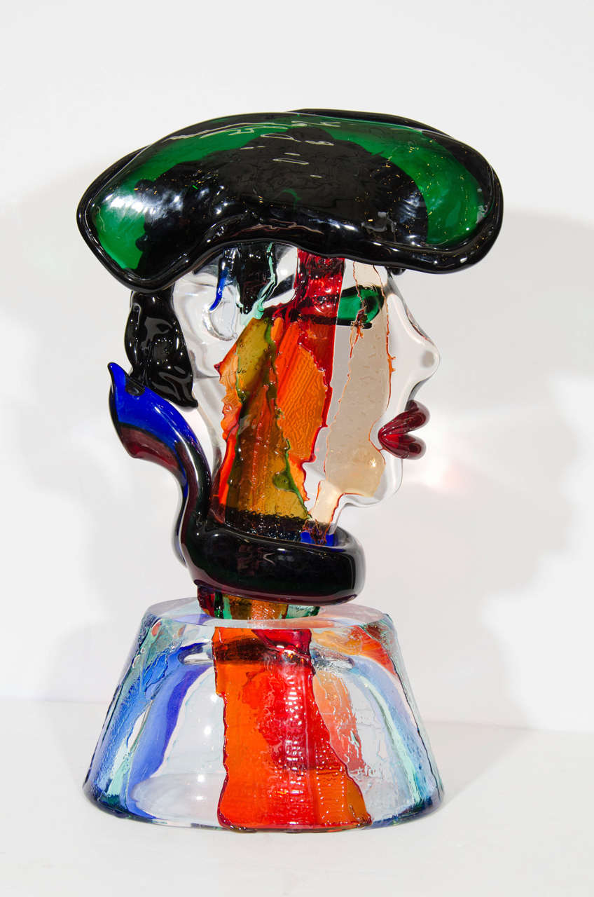 A vintage multicolor Murano glass sculptural head or bust of a gondolier influenced by the work of Picasso and signed S. Toso.