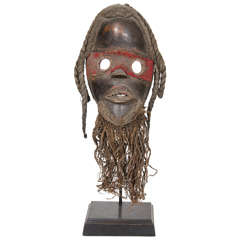 Painted Dan Style Wooden Mask with Decorative Raffia