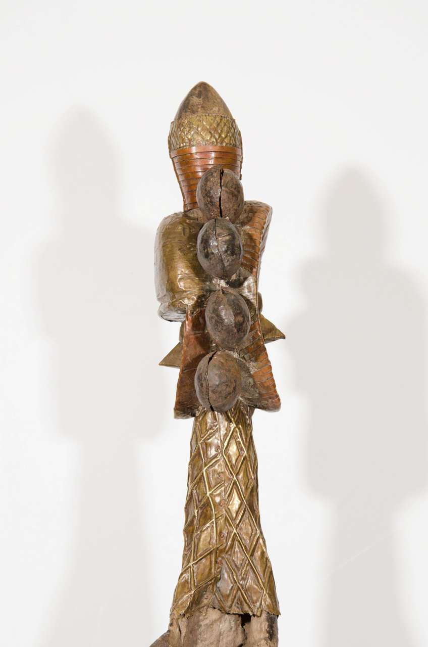 In the Style of Bakota Double-Faced Copper and Wood Reliquary Guardian Figure 1