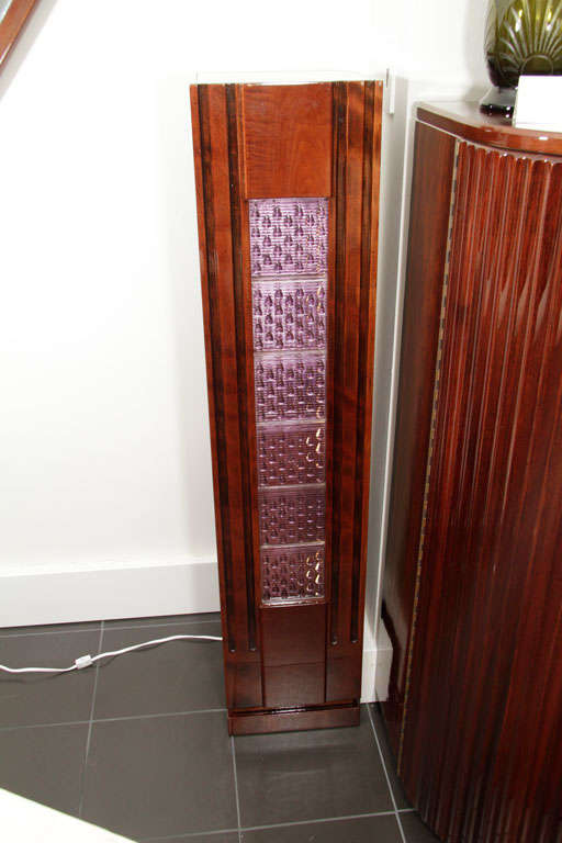 Pair of machine age light-up columns with purple tear drop glass enclosures on the front; solid maple.