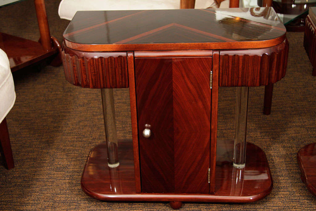 Pair of glass rod end tables in black walnut veneer, maple, glass rods and brushed nickel hardware, circa 1930.