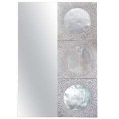 Rectangular mirror with sculptural relief panel