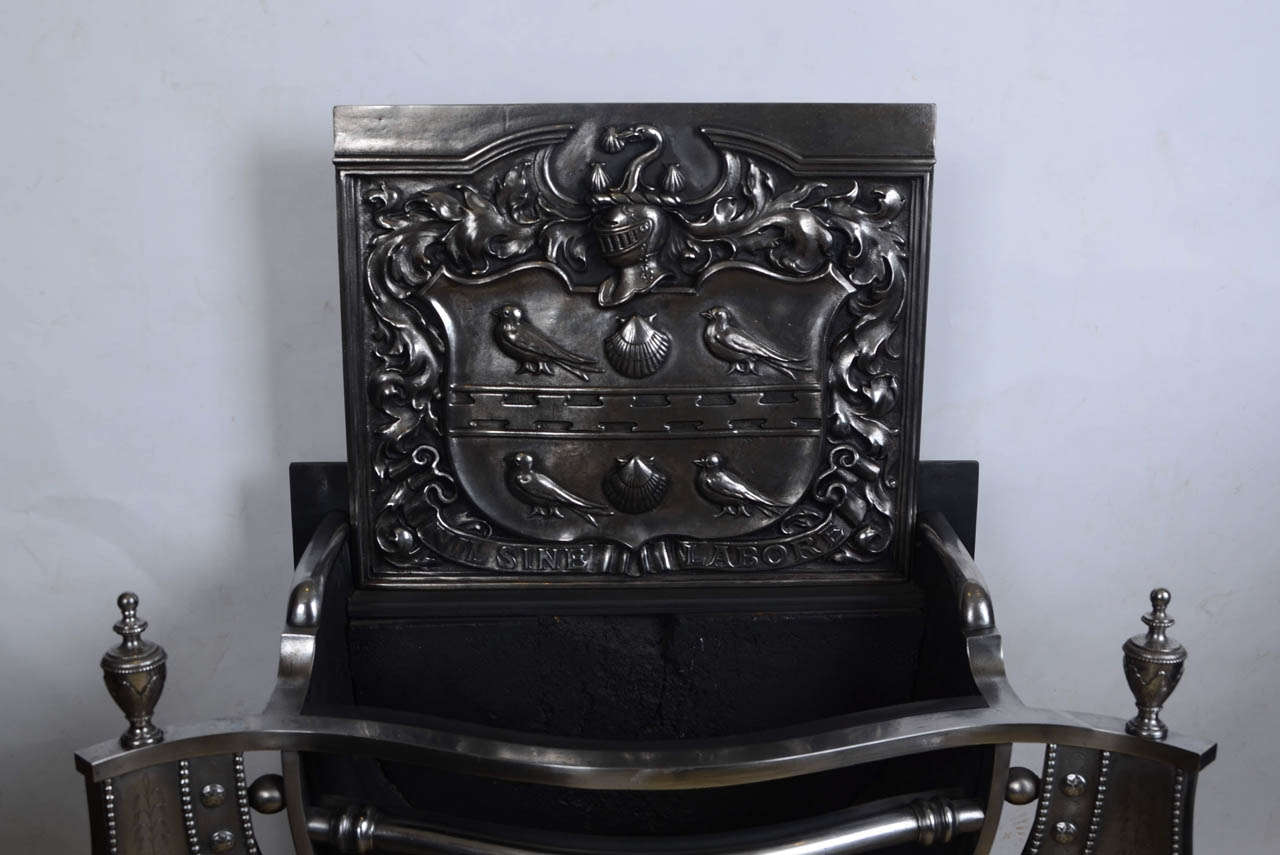 Neoclassical Pair of Antique Polished Cast Iron Fire Baskets with Coat of Arms For Sale