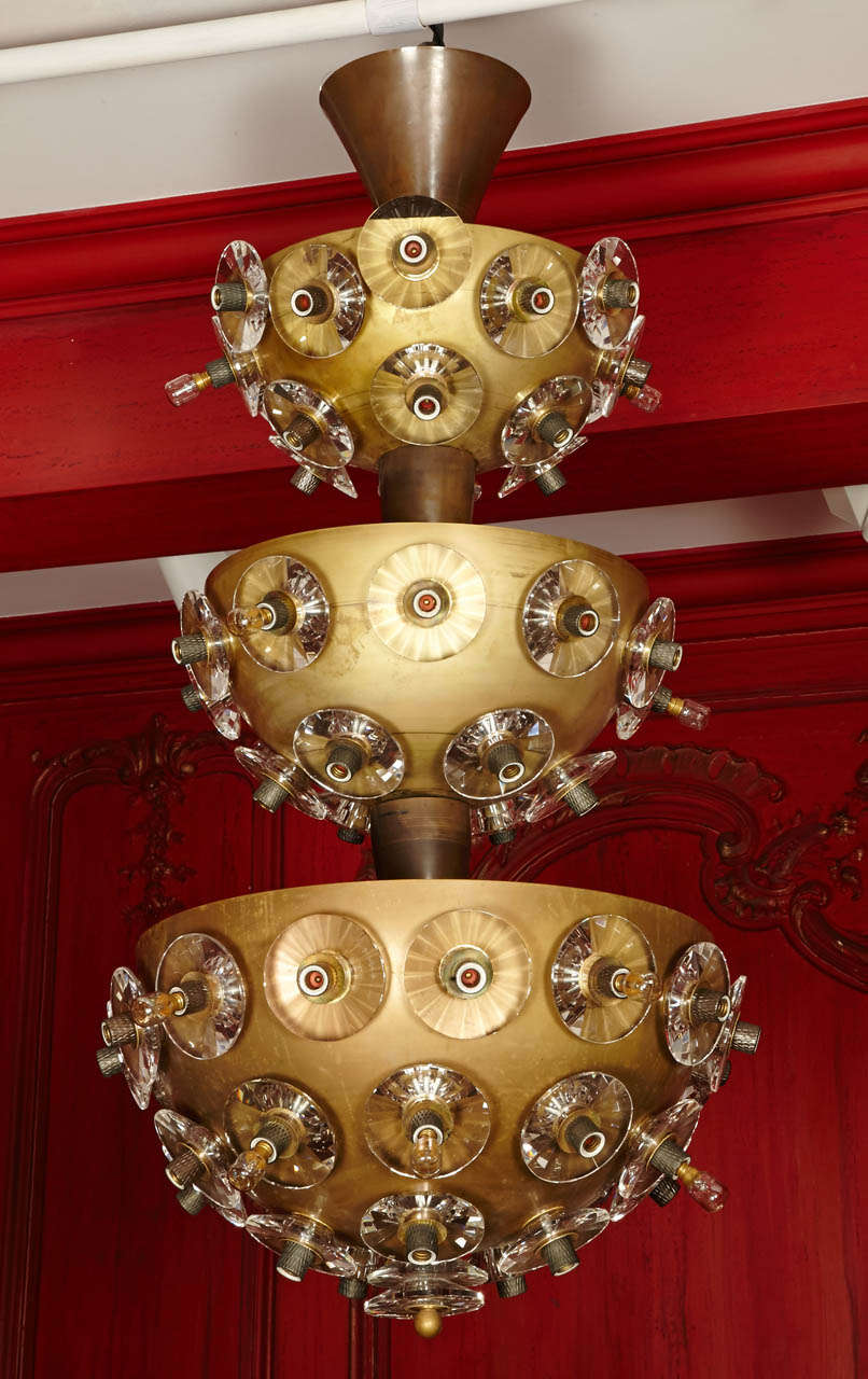 Pair of three-level chandeliers, half circle in patinated gilt metal, numerous lightings, small glass cups, newly electrified