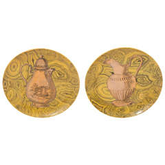 A Pair of Porcelain "Stroviglie" Plates by Piero Fornasetti