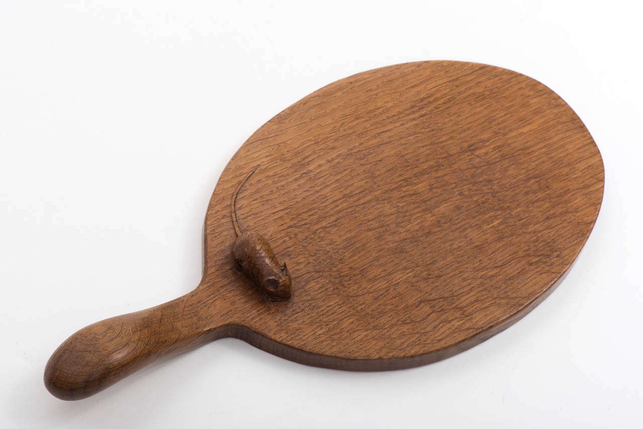 An early Robert Thompson “Mouseman” Cheese board.
Plump carved mouse.
English
Circa 1950
H 5cms x w 37.5cms x d 18cms