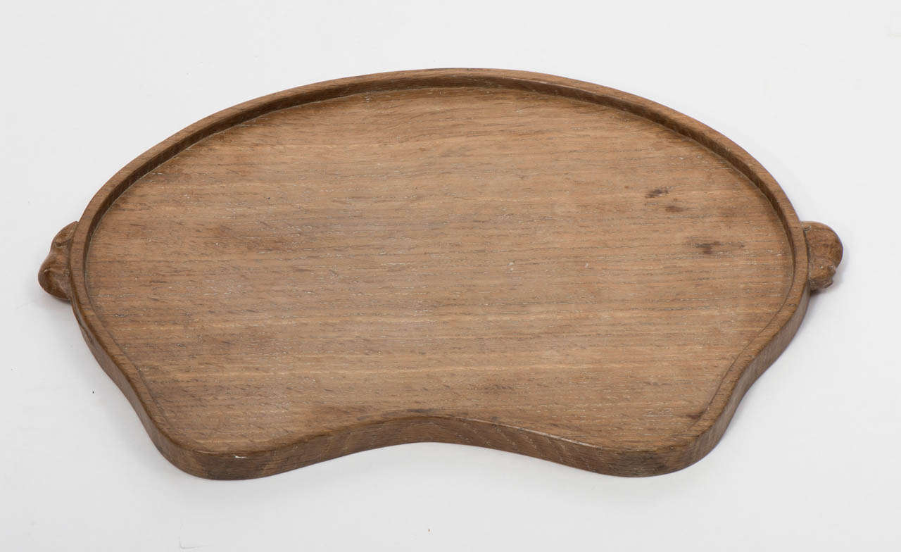 A Robert Mouseman Thompson Oak Tray of kidney shaped form.
Carved mouse handles to each side.
English
Circa 1950
47cms wide.