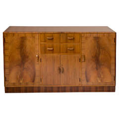 A Walnut Art Deco Side Cabinet by Heals of London