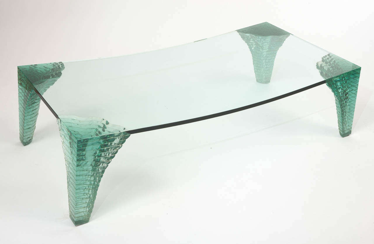 A Danny Lane large coffee Table.
“Atlas Table”
The large slightly concave green tinted rectangular top set on four stacked green tinted glass legs.
Circa 1989
English
38cms h x 139cms wide x 70cms d