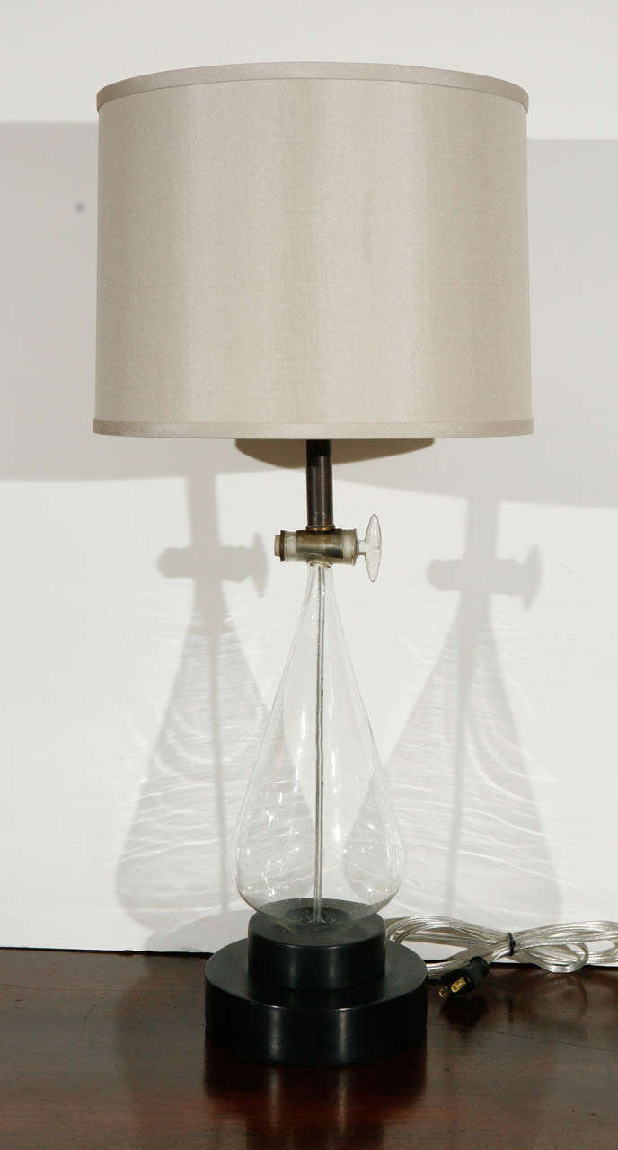 Blown glass siphon as lamp with a custom shade, circa 1900.
