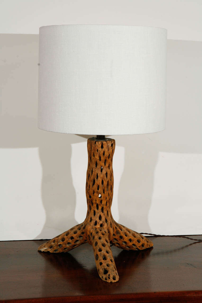 A tripod table lamp from dried cactus trunk with a custom shade.
Circa 1950