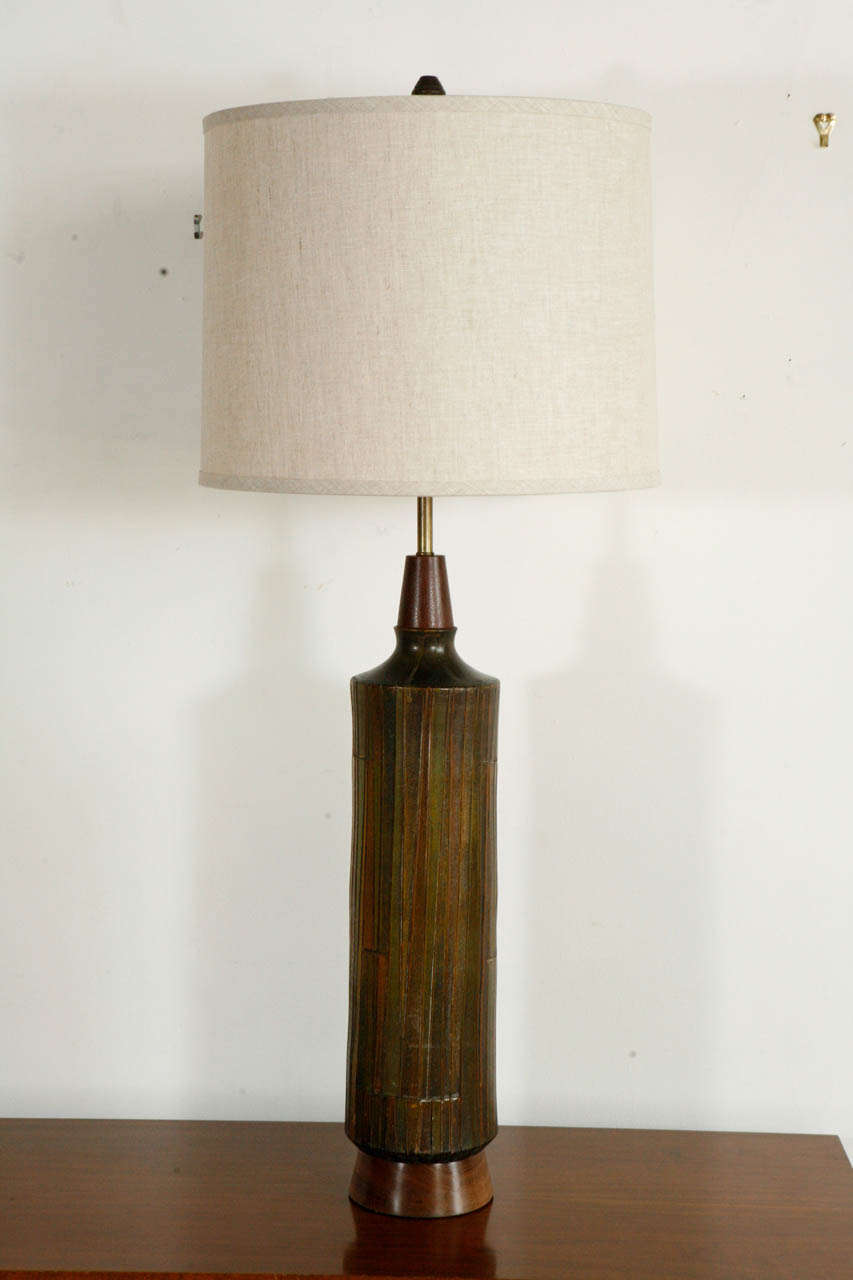 Excellent tall mid-century lamp with original ceramic finial. Shade sold separately. Newly rewired.