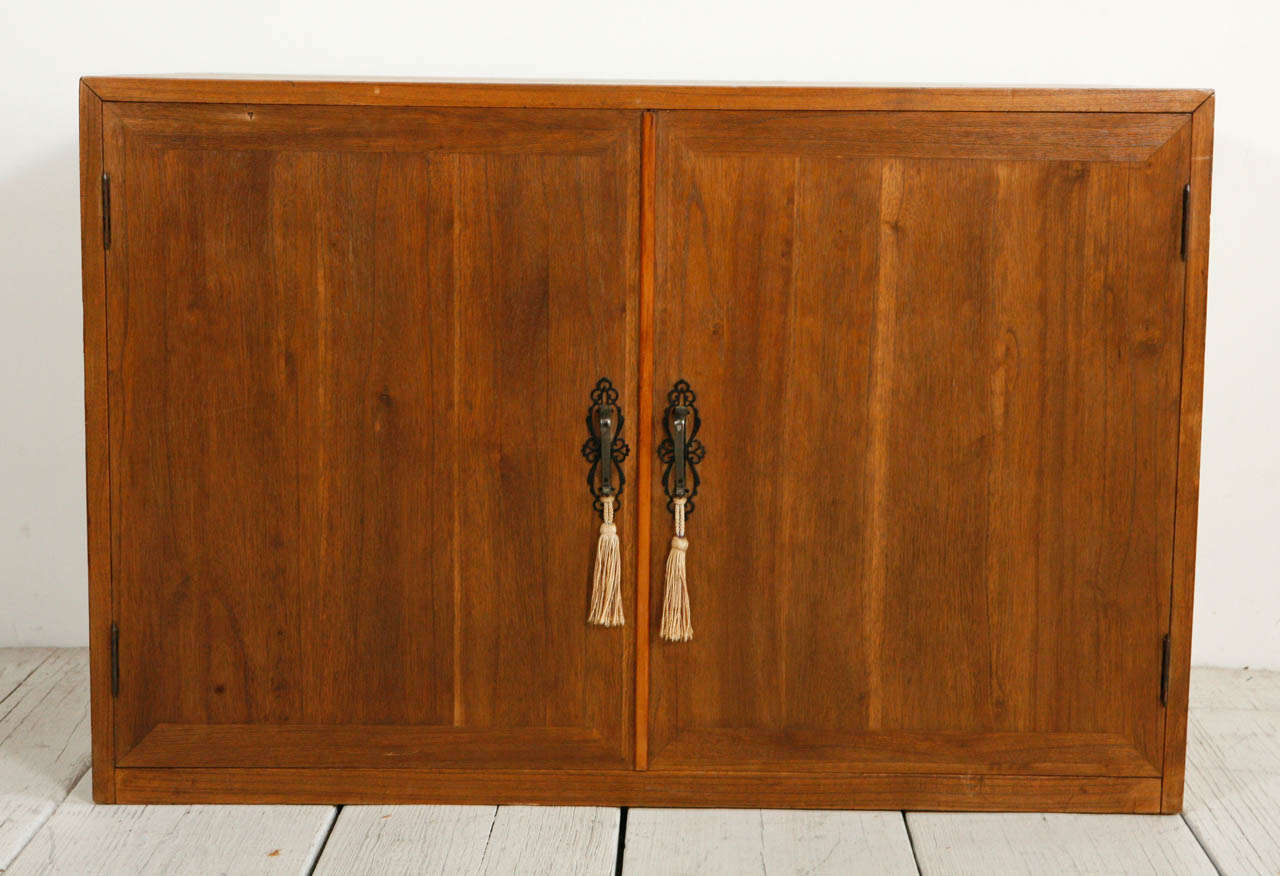 Kiri wood tansu / kimono chest with two doors and five interior drawers.