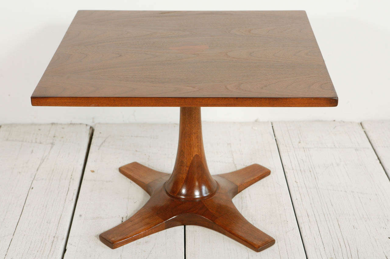 Beautiful table with contrast wood where table meets base.