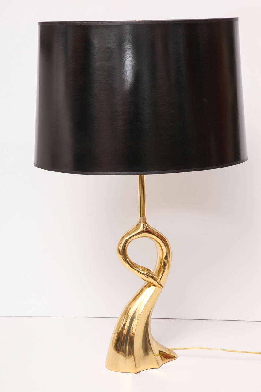 Decorative brass swan table lamps, C 1950, Italy. They come with black or white lamp shades.