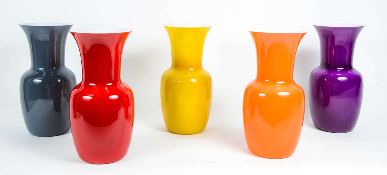 Set of six vases in Murano glass, signed Toso. (One more in black).