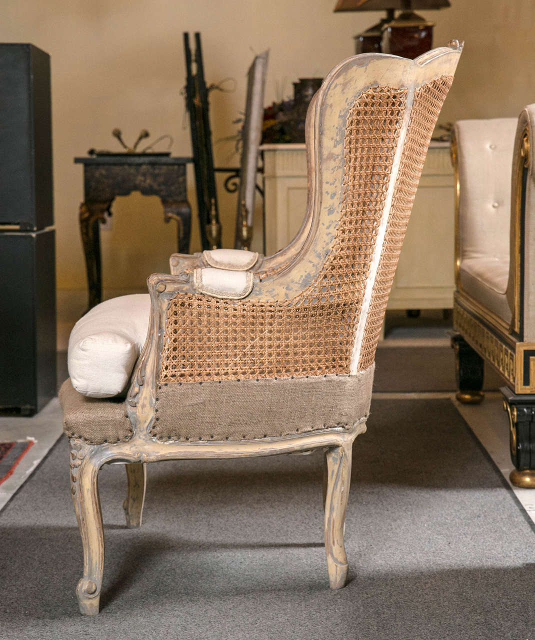Mid-20th Century Pair of French Louis XV Style Wingback Caned Bergère Chairs