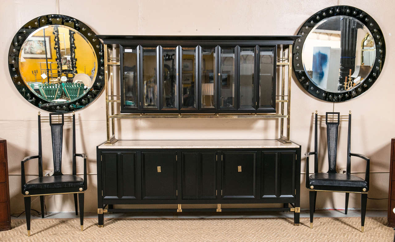 The Fine Maison Jansen Style China Cabinet / Sideboard  from the Hollywood Regency Era is simply stunning. The sideboard base easily shows complete and looks breathtaking with or without the showcase top. The bronze decorated base having a pair of
