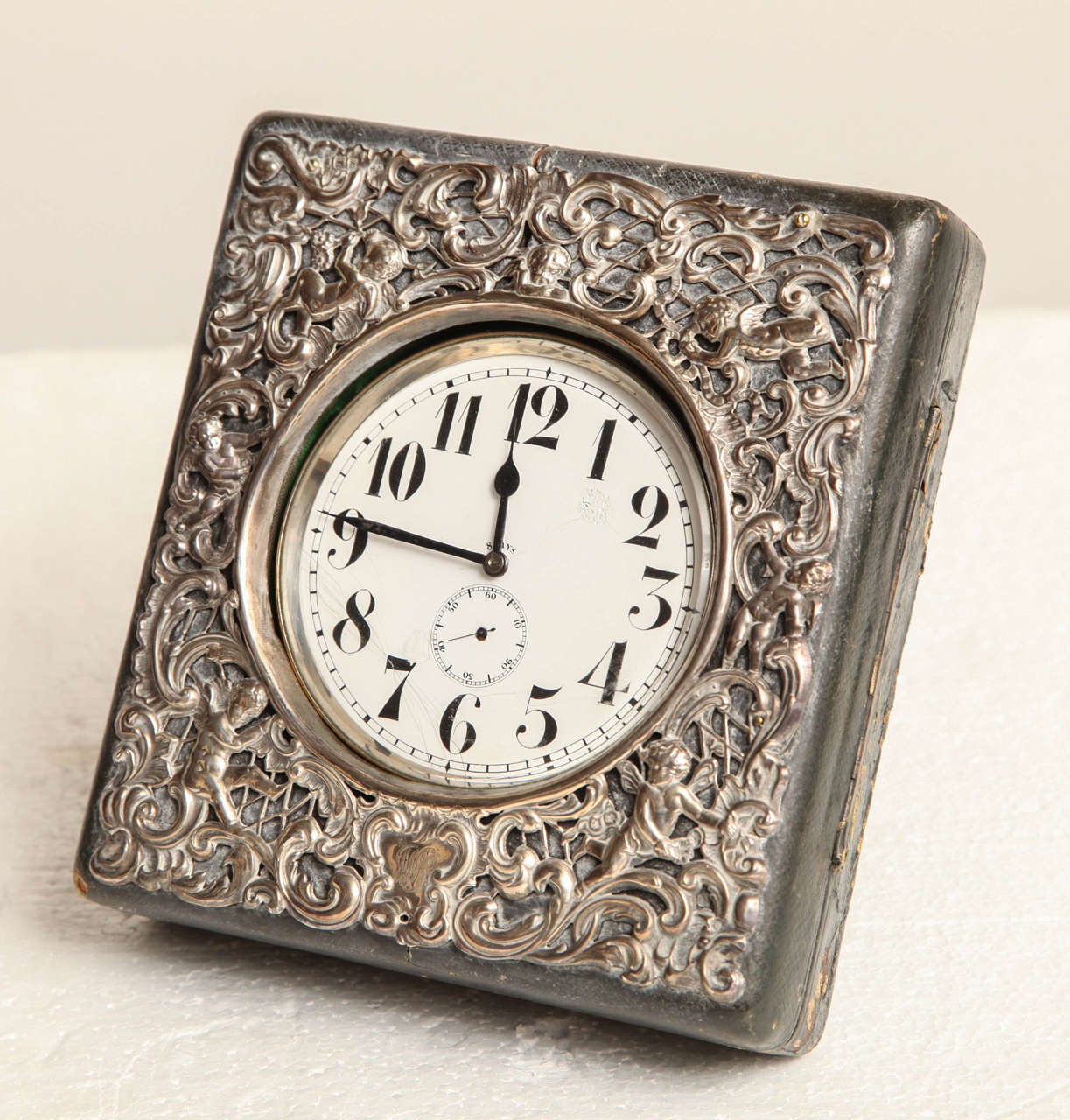 Late 19th Century Swiss Traveling Clock Made for the English Market
Enclosed in a Silver and Leather Case